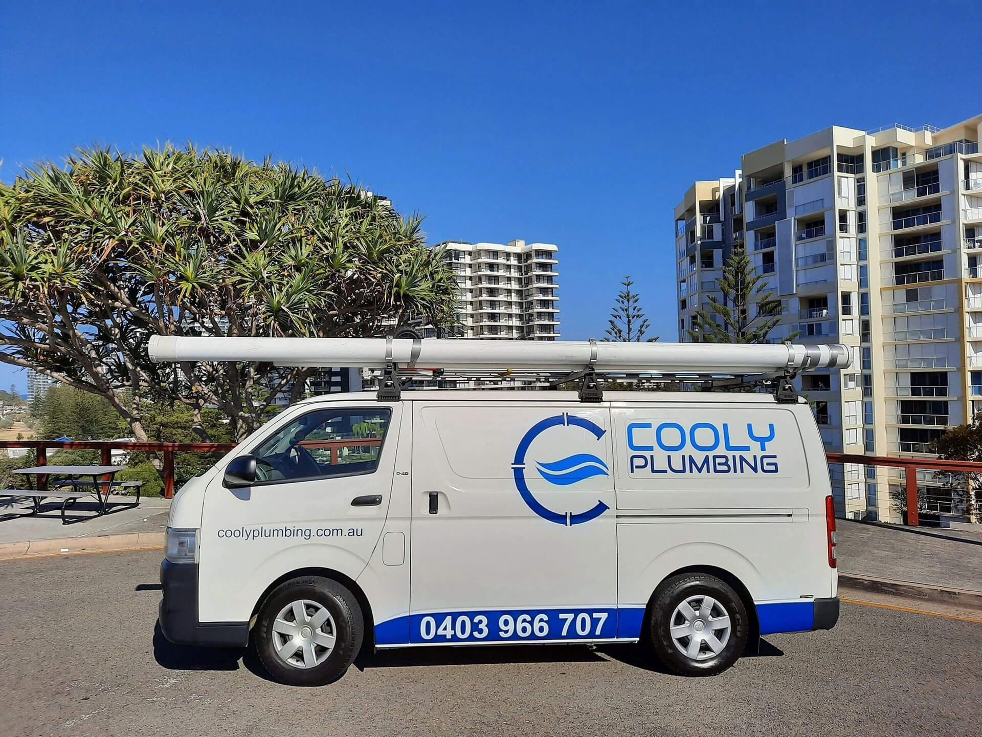 Hero Coolyplumbing bg Mike from the Cooly Plumbing team getting plumbing tools from his van